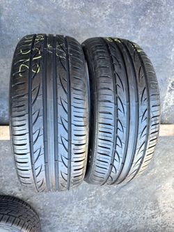 Set of 2 nice tires 215/45/18 ( We install & balance)