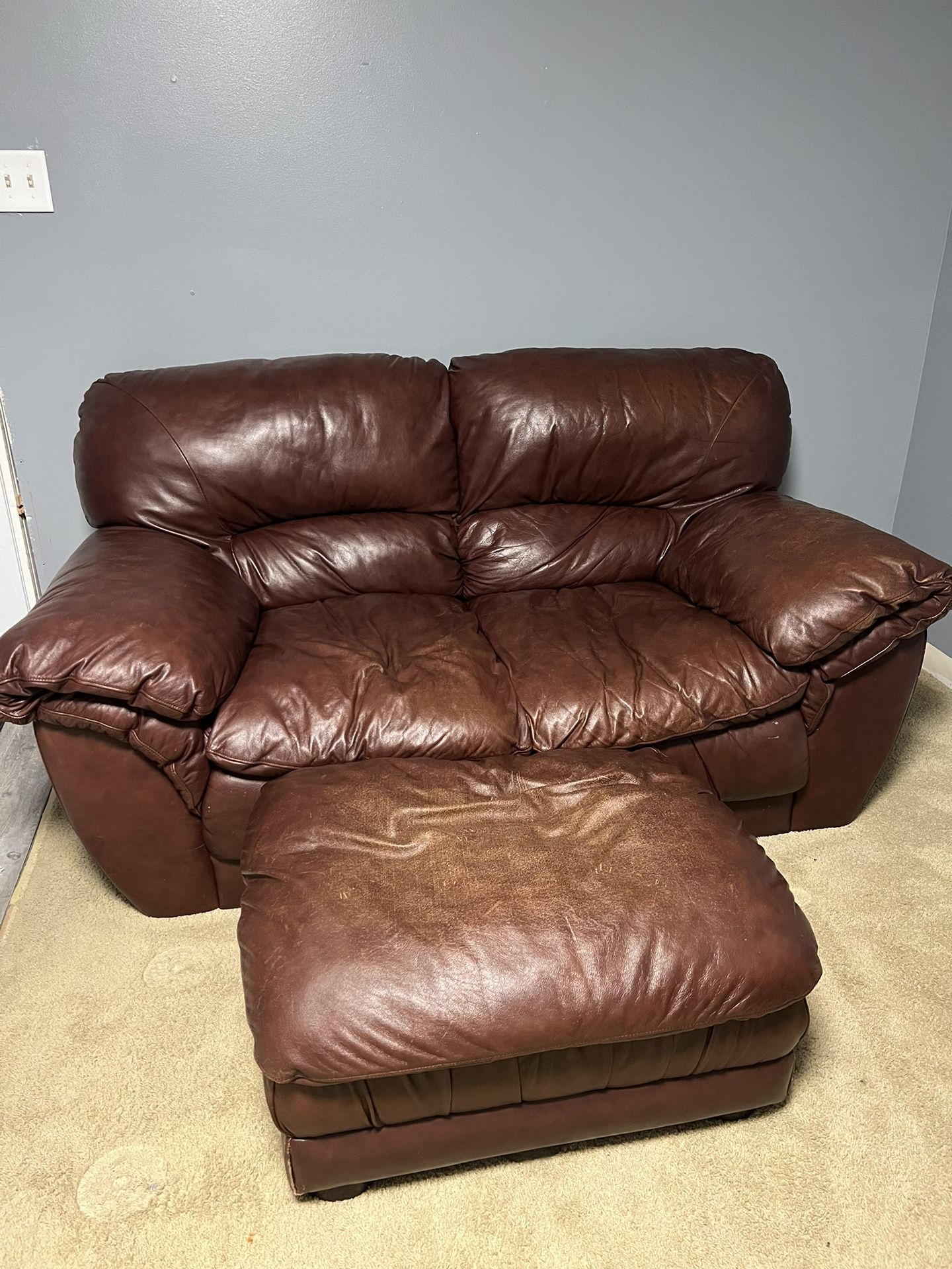 Brown leather Couch + Ottoman 