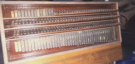 Four liner folding harmonium