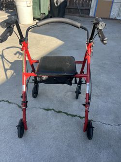 Almost New Walker With Brakes 