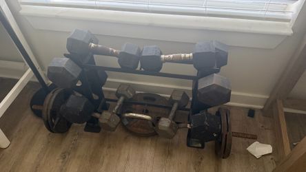 Dumbbell Sets of 15, 20, 30,40 and the bar with 4-10s and 2-25s
