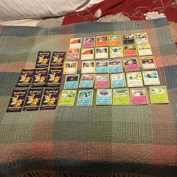 30 Pokemon Cards And 8 Unopened Trick Or Trade Packs