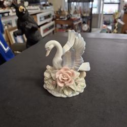 Porcelain Swan With Blue & White Feathers On A Log W/Base Of Green Leaves & 3D Pink Rose- By K's Collection 4" X 4"