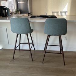 Beautiful soft barstools with wooden legs