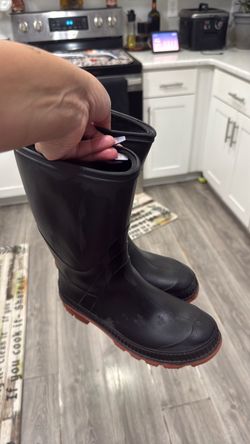Young girl, rain boots