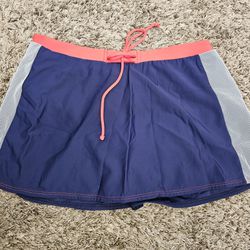 Pure Paradise Swim Skirt Swimwear Size 10 Resort Clothes Nylon Blue Coral 

Blue and coral waisted skirt with blue bottom underneath.
White stripes on