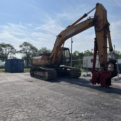Case CX290 excavator with grappler/concrete breaker