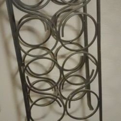 Wine set and rack for 20 bucks no lowballing I'm just moving getting rid of stuff
