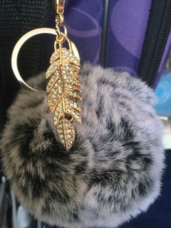 Assorted fun keychains 🛍🔑 Soft fur ball with feather ornament $12 / Purple Foxy keychain $12 🦊🔑 Leather wallet keychain $20 🔑