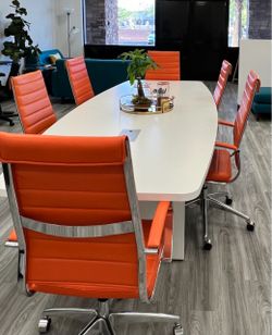White Boat-Shaped Conference Table with Power Grommets