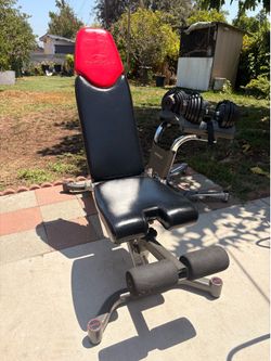 5/52.5 adjustable dumbbells stand and adjustable bowflex bench the only thing is that one of the dumbbells is missing one of the smallest plates  othe