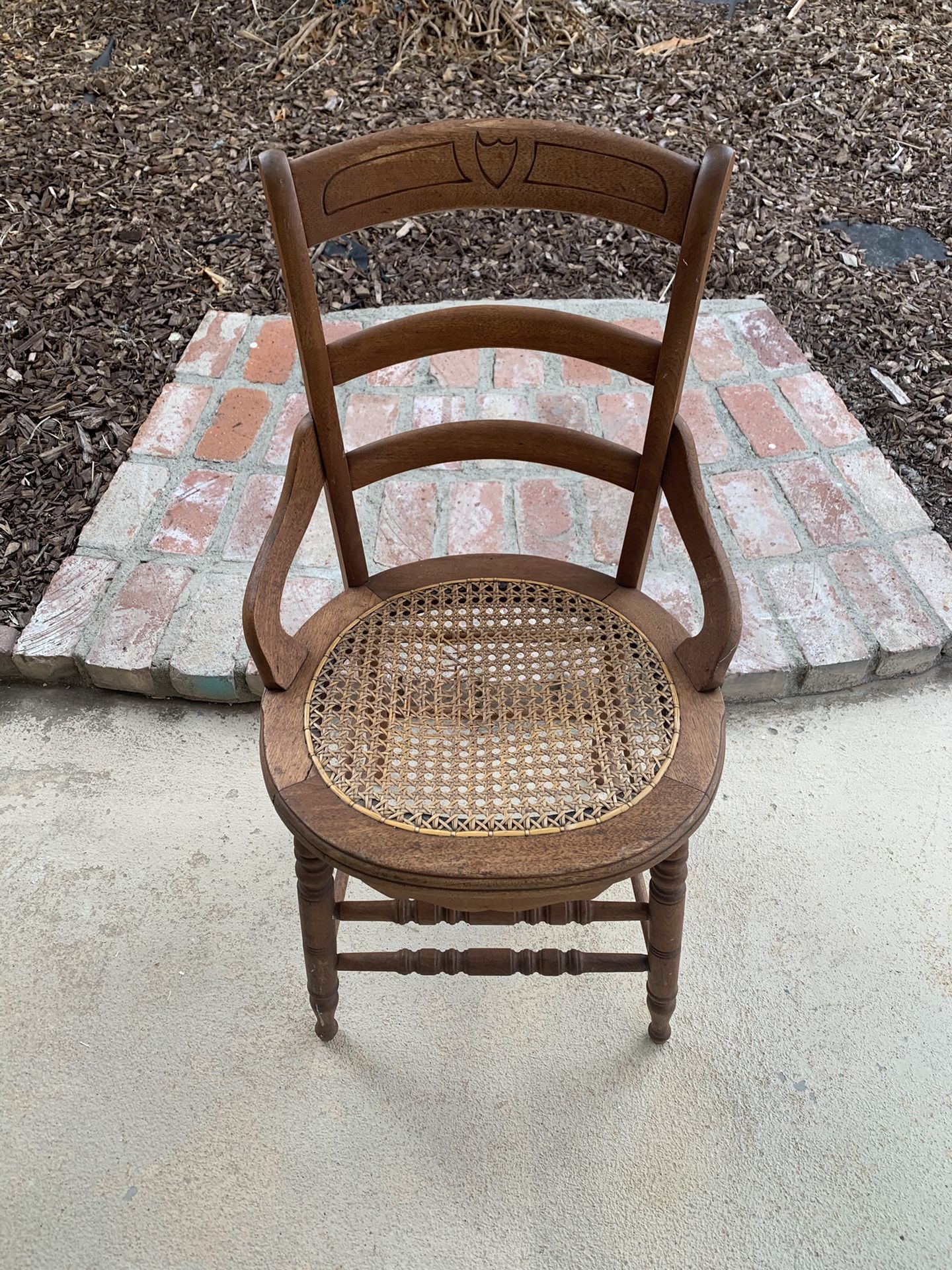 Vintage wood chair with cane seat