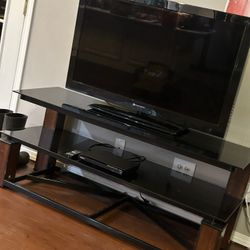 Tv, Stand, Dvd Player With Dvds