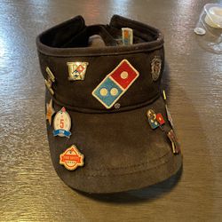 Domino’s hat with Badges