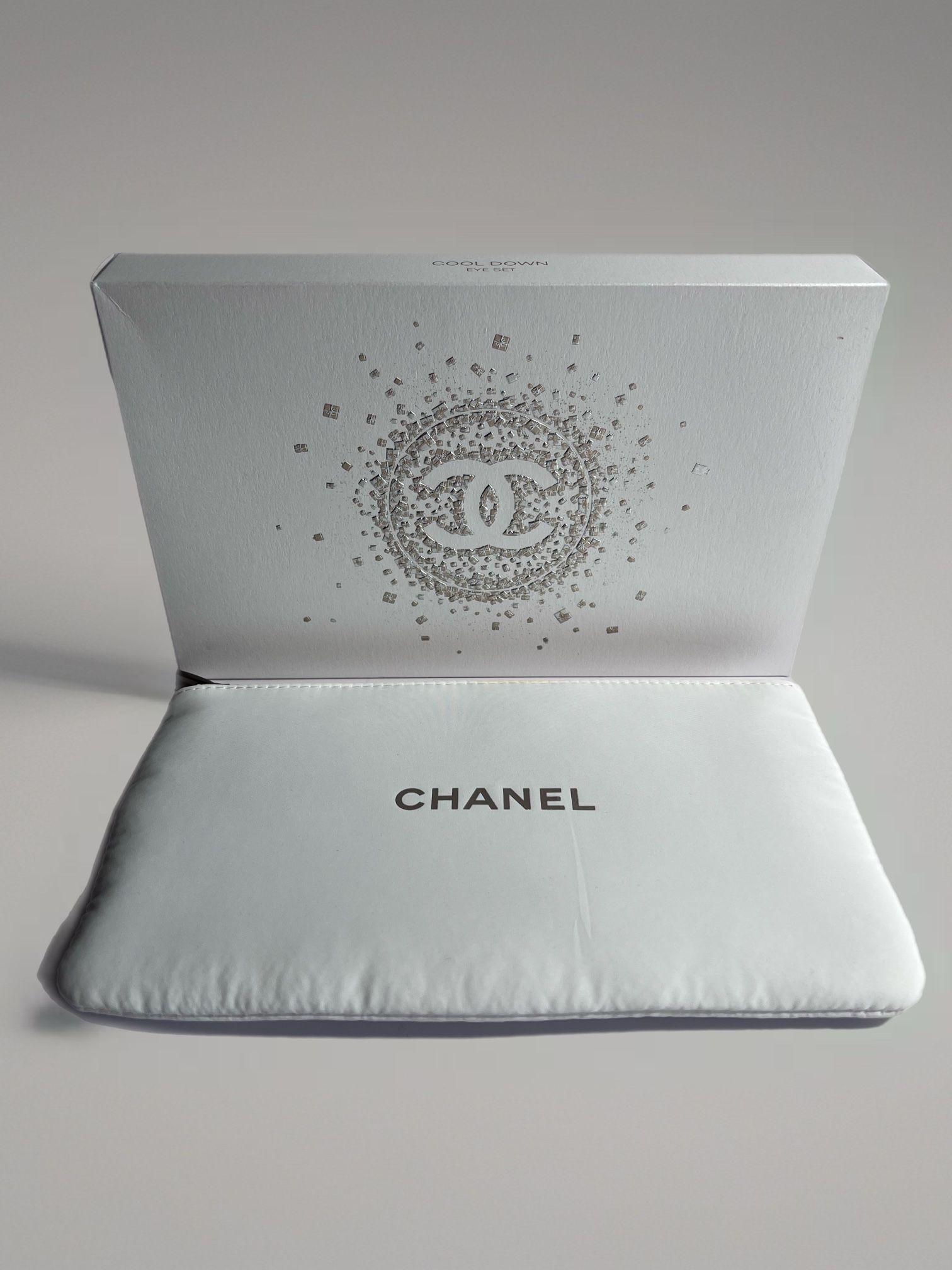 Brand New Chanel Satin Cosmetic Pouch, measuring 8 x 5 inches.