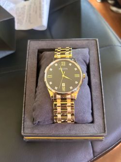 Gold bulova watch