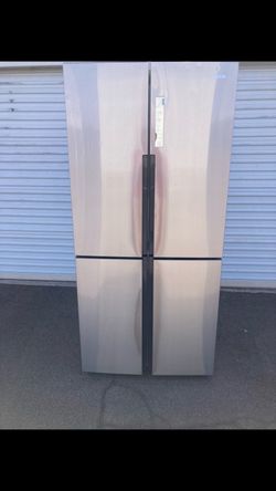 Haier 16.4 cubic foot four-door refrigerator, stainless steel, in good condition, clean and nice, one month warranty, delivery available. Dimensions: