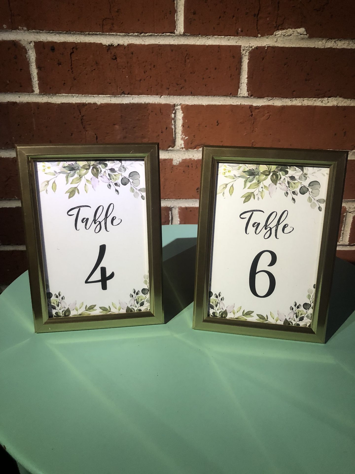 Gold Frames And Table Numbers 