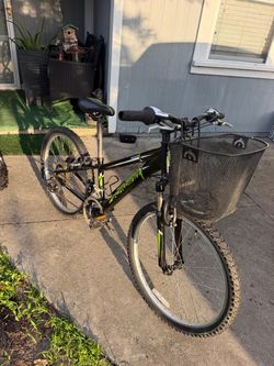 Black and Green Mountain Bike with Front Basket