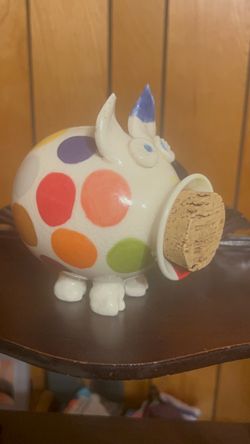 Whimsical, hand painted ceramic polka dot piggy bank with cork nose
