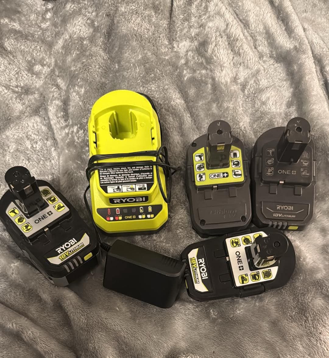 RYOBI 3 4AH AND 1 2AH BATTERY’S WITH CHARGER.