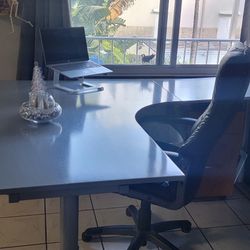 Steel frame.\nWooden finish top desk.