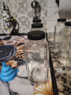New Clear Glass Bottles with Black Lids