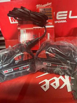 MILWAUKEE M18  2 BATTERIES 5.0 and M18 CHARGER  BRAND NEW OUT THE BOX NEVER USED   (( Read below ))