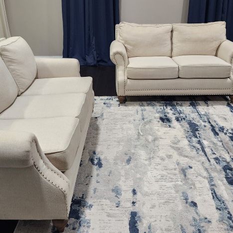 Baers Couch and Loveseat With Rug 