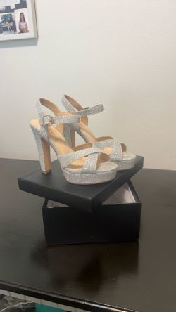 Silver high heels size 7.5