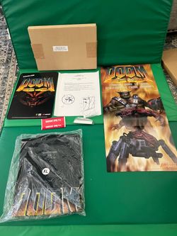 Doom 64 store promotional card with shirt and fold out poster