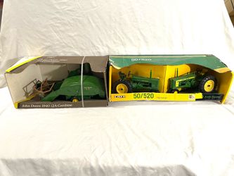 Mint condition US made by toy maker ERTL scale 1/16 diecast, John Deere toy, tractors, and trailer. Total retails $253.