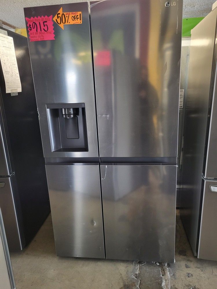 Side By Side LG Stainless Steel 27 Cubic. Feet.