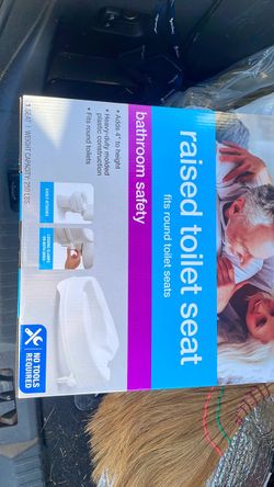 Raised toilet seat