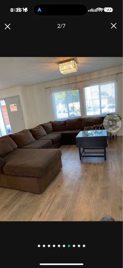 Large tan brown Sectional Couch W/free King Quilts Sofa Living Spaces Sleep Three!