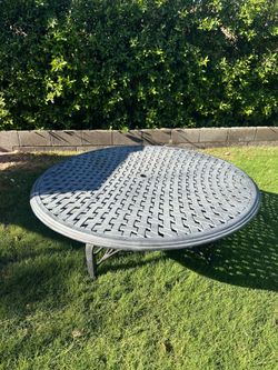 Patio table with umbrella holder