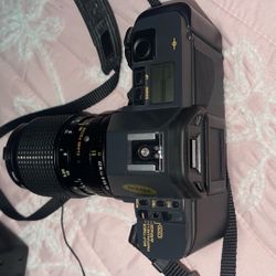 Vivitar Series 1 70-210mm  Cannon T70 With A 35-105 Mm And Two More Small Lens 