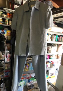 2pc women’s blue suits size 12 Larry Levine