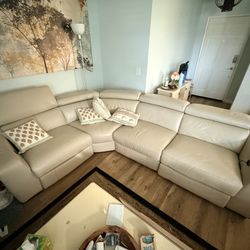 Power Reclining Leather Sectional With USB And Adjustable Headrests