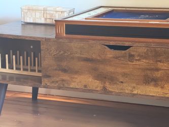 Adjustable Height Wooden Coffee Table with Hidden Compartments and Shelves
