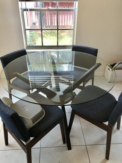 Solid wood round glass table 48” wide