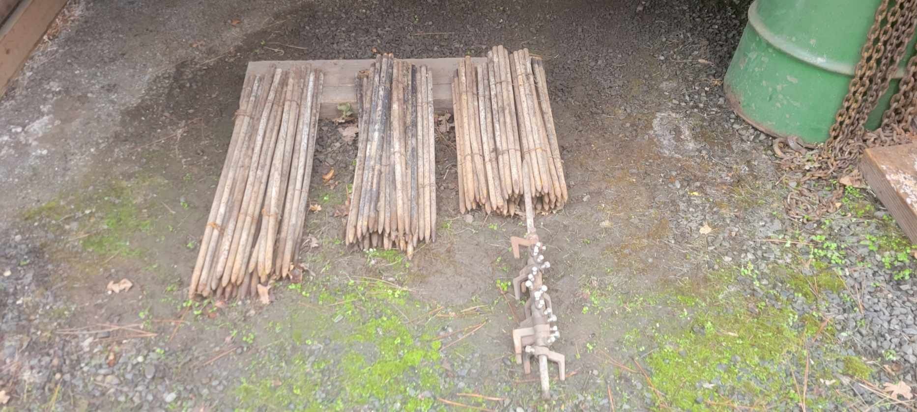 Concrete stakes, brackets and construction fencing