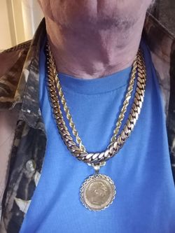 Cuban 10 k chain. 25 in long. 231.1 gram like new