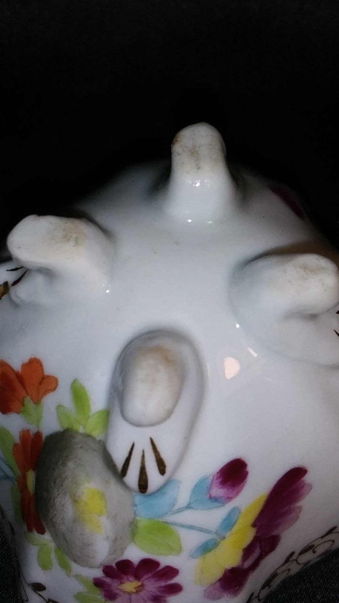 Miniature Porcelain Tea Cup. Four Footed Hand Painted Gold Trim
