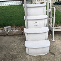Swimming pool stairs safety deck ladder attaches to the deck $140