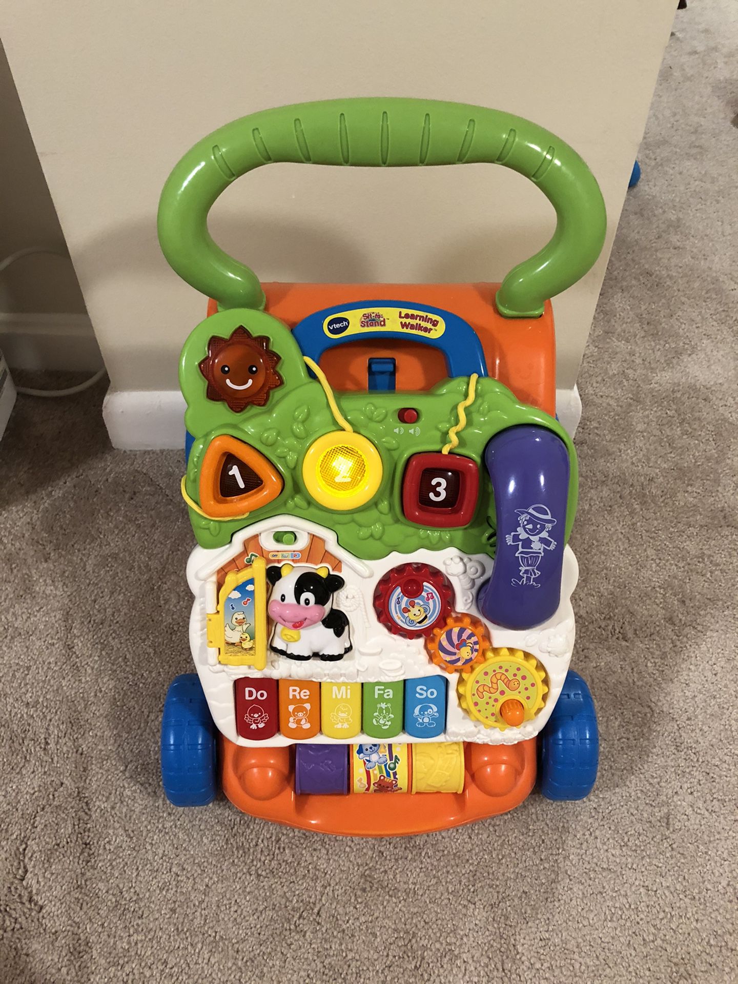 Vtech sit to stand walker