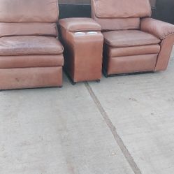Two Leather Reclining Chairs With Center Console 