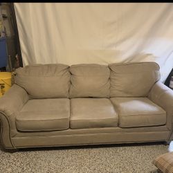 Ashley Furniture Olsberg Faux Leather grey couch 