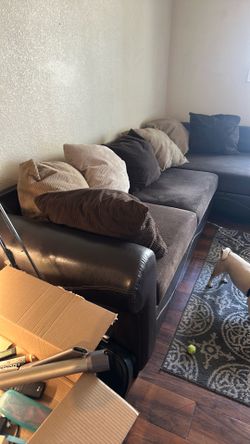 Brown sectional couch with chase