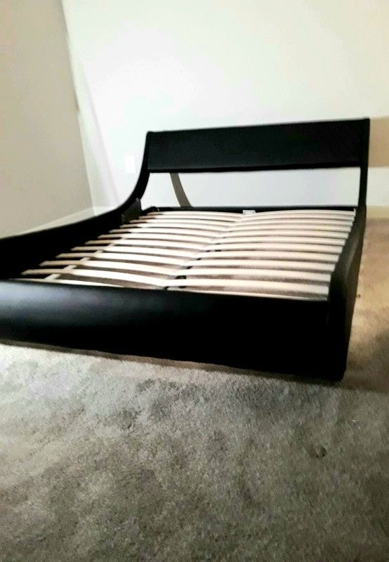 NEW KING UPHOLSTERED BED FRAME. Mattress sold separately